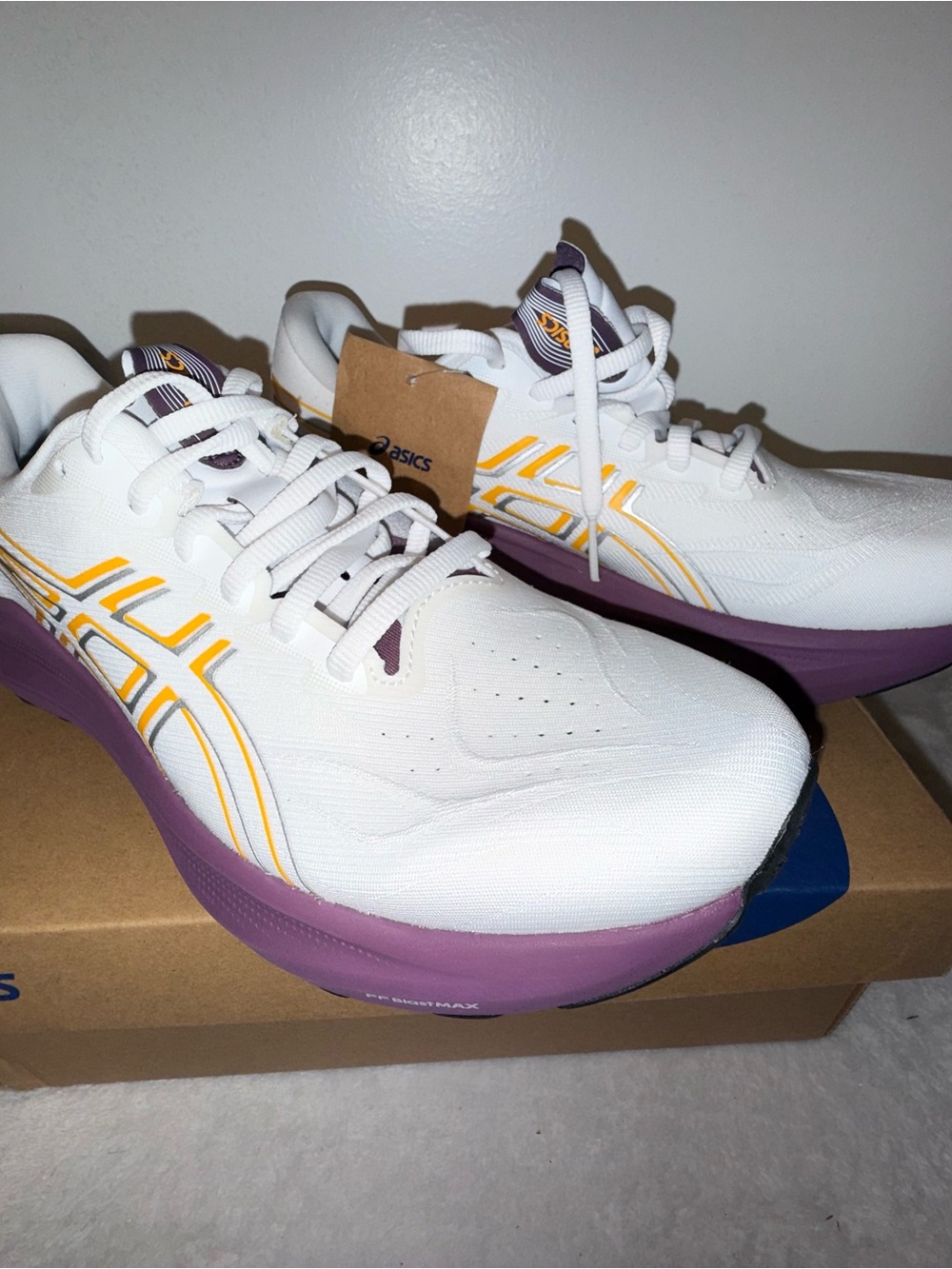 ASICS White Athletic Shoes with Purple Soles and Yellow Stripes - Picture 3 of 5